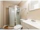 Clean bathroom featuring a shower stall, toilet, and vanity with a white sink at 3614 Fairburn Nw Pl, Atlanta, GA 30331