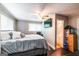 Comfortable bedroom with a TV, ceiling fan, and access to a bathroom at 3614 Fairburn Nw Pl, Atlanta, GA 30331