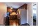 Well-equipped kitchen with brown cabinets, stainless steel refrigerator and modern appliances at 3614 Fairburn Nw Pl, Atlanta, GA 30331