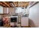 Laundry room with modern washer and dryer units and a bright rug at 3614 Fairburn Nw Pl, Atlanta, GA 30331