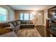 Inviting living room with plush seating, large windows, and cozy decor for comfort at 3614 Fairburn Nw Pl, Atlanta, GA 30331