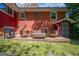 Outdoor patio with wicker furniture and a grill, perfect for gatherings and barbecues at 3614 Fairburn Nw Pl, Atlanta, GA 30331