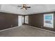Bedroom with carpet floors and a tray ceiling is enhanced by two windows providing natural light at 5003 Samantha Ct, Mcdonough, GA 30252