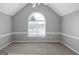 Spacious bedroom with vaulted ceiling, arched window, neutral carpet and paint at 5003 Samantha Ct, Mcdonough, GA 30252