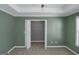 Bedroom featuring a double door closet and walk-in closet at 5003 Samantha Ct, Mcdonough, GA 30252