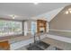 Kitchen featuring granite counters and a view to the outside through bright windows at 5003 Samantha Ct, Mcdonough, GA 30252