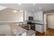 Charming kitchen featuring granite countertops, stainless appliances, recessed lights and breakfast bar at 5003 Samantha Ct, Mcdonough, GA 30252