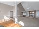 Open-concept living room with hardwood and carpet flooring, fireplace, and abundant natural light at 5003 Samantha Ct, Mcdonough, GA 30252