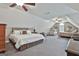Spacious carpeted bedroom with vaulted ceiling and multiple beds providing plenty of room at 35 Ryans Ct, Sharpsburg, GA 30277