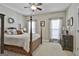 Cozy bedroom with carpeted floors, neutral paint, and two windows providing natural light at 35 Ryans Ct, Sharpsburg, GA 30277