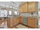 Bright kitchen with granite countertops, stainless steel appliances, and an eat-in area at 35 Ryans Ct, Sharpsburg, GA 30277