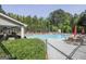 Community pool featuring sun loungers and a covered patio area for residents enjoyment and relaxation at 35 Ryans Ct, Sharpsburg, GA 30277