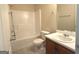 Clean bathroom with shower, sink, and toilet featuring a neutral color scheme at 661 Outlook Way, South Fulton, GA 30349