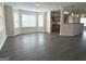 Bright and airy living space with new flooring and multiple windows offering natural light at 661 Outlook Way, South Fulton, GA 30349