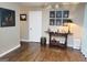The entryway is adorned with elegant decor, including wooden floors and neutral-toned walls at 1475 Woodington Cir, Lawrenceville, GA 30044