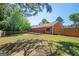 Large backyard featuring a wooden deck and a privacy fence, perfect for entertaining at 4691 Garden Hills Ct, Stone Mountain, GA 30083