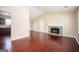 Spacious living area with hardwood floors, a fireplace, and natural light at 4691 Garden Hills Ct, Stone Mountain, GA 30083