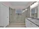 Stylish bathroom boasts a tiled shower, a glass door, and modern fixtures and finishes at 250 Stonecreek Pkwy, Covington, GA 30016