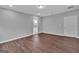 Large bedroom with hardwood floors, fresh paint and an attached bathroom at 250 Stonecreek Pkwy, Covington, GA 30016
