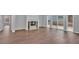 Spacious living room with a fireplace, hardwood floors, and sliding glass door to patio at 250 Stonecreek Pkwy, Covington, GA 30016