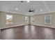 Spacious room features wood floors, large windows for great natural light, and recessed lighting at 250 Stonecreek Pkwy, Covington, GA 30016