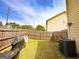 Well-maintained backyard with a wooden fence, offering privacy and a functional outdoor space at 304 Commons Dr, Jonesboro, GA 30236
