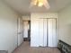 Cozy bedroom features an closet and an access door at 304 Commons Dr, Jonesboro, GA 30236