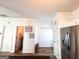 Well-designed kitchen area with stainless steel appliances and convenient access to storage and rooms at 304 Commons Dr, Jonesboro, GA 30236