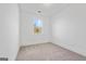 Bright bedroom with a window that provides natural light and neutral carpet, creating a serene atmosphere at 1516 Parks Edge Nw Ln, Atlanta, GA 30318
