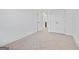 Cozy bedroom with plush carpet and ample closet space, perfect for a relaxing retreat at 1516 Parks Edge Nw Ln, Atlanta, GA 30318