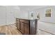 Kitchen island featuring granite countertops and dark wood cabinetry, with an open view to the backyard at 1516 Parks Edge Nw Ln, Atlanta, GA 30318