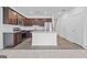 Well-equipped kitchen with granite countertops, stainless steel appliances, dark wood cabinets, and a kitchen island at 1516 Parks Edge Nw Ln, Atlanta, GA 30318