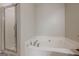 Bright bathroom features a stand alone shower and soaking tub with chrome fixtures at 2705 Maple Park Pl # 29, Cumming, GA 30041