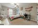 Bright ' bedroom featuring a work desk and a ceiling fan at 2705 Maple Park Pl # 29, Cumming, GA 30041