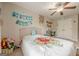 Bright ' bedroom featuring a closet and a ceiling fan at 2705 Maple Park Pl # 29, Cumming, GA 30041