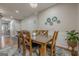 Cozy dining room with wooden table and easy access to main hall at 2705 Maple Park Pl # 29, Cumming, GA 30041