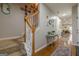 Hallway featuring hardwood floors and stairs at 2705 Maple Park Pl # 29, Cumming, GA 30041