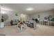 Large living room with neutral carpet, comfortable sofas, and space for a home office area at 2705 Maple Park Pl # 29, Cumming, GA 30041