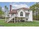 The rear of the home features a large deck and backyard at 20 Allie Dr, Mcdonough, GA 30252