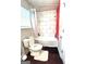 Second bathroom highlighting a shower-tub combination with tile surround and a traditional toilet at 579 Wexwood Dr, Riverdale, GA 30274