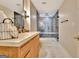 Modern bathroom showcasing a glass enclosed shower, sleek fixtures, and beautiful marble floors at 285 Broadmoor Dr, Fayetteville, GA 30215