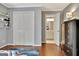 Bedroom with hardwood floors leads to a private bathroom and features ample closet space at 285 Broadmoor Dr, Fayetteville, GA 30215