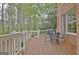 Wooden deck with black patio furniture, great for outdoor entertaining at 285 Broadmoor Dr, Fayetteville, GA 30215