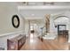 Spacious foyer with hardwood floors, staircase, and views into the living and dining areas at 285 Broadmoor Dr, Fayetteville, GA 30215