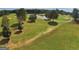 Lush golf course view showcasing the well-maintained grounds and serene environment at 285 Broadmoor Dr, Fayetteville, GA 30215