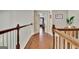 Hallway with wood floors and view into another room at 285 Broadmoor Dr, Fayetteville, GA 30215