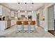 Spacious kitchen with stainless steel appliances, granite countertops, and a breakfast bar with seating for three at 285 Broadmoor Dr, Fayetteville, GA 30215