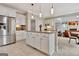 Large kitchen island with barstool seating and stainless steel appliances, perfect for entertaining at 285 Broadmoor Dr, Fayetteville, GA 30215