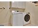 Laundry room featuring white washer and dryer at 285 Broadmoor Dr, Fayetteville, GA 30215