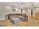 Spacious living room with a large sectional sofa, ottoman, and side tables, perfect for relaxation and entertainment at 285 Broadmoor Dr, Fayetteville, GA 30215